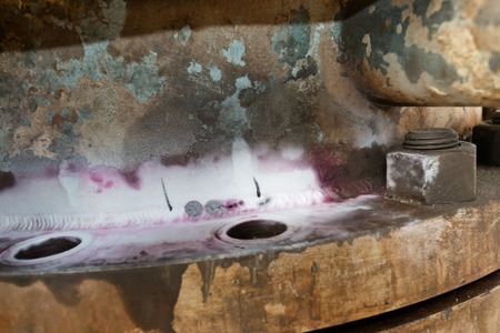 Through crack discovered in the corner of the weld with liquid penetrant inspectionの写真素材