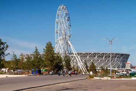 VOLGOGRAD, RUSSIA - SEPTEMBER 22: New Ferris wheel installed in the Park of culture and recreation near the stadium Volgograd-arena. September 22, 2018  in Volgograd, Russia.のeditorial素材