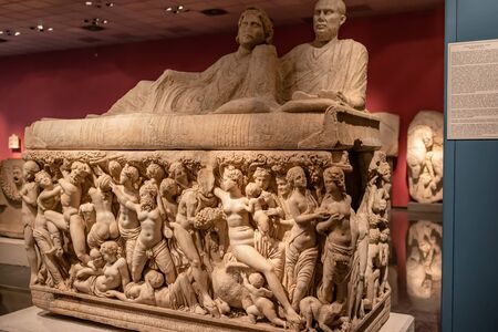 ANTALYA, TURKEY - MAY 17: Ancient sarcophagus decorated with bas-reliefs and sculptures depicting people, gods and historical scenes . May 17, 2018 in Antalya, Turkeyのeditorial素材