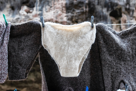 Down-filled underwear from the wool of mountain sheep, which the locals were binding themselves for sale to tourists in the mountain gorgesの写真素材