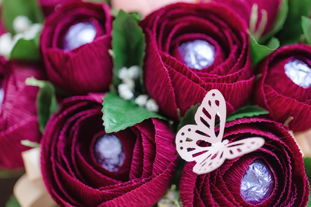 Handmade gift bouquets of paper flowers with chocolates insideの写真素材