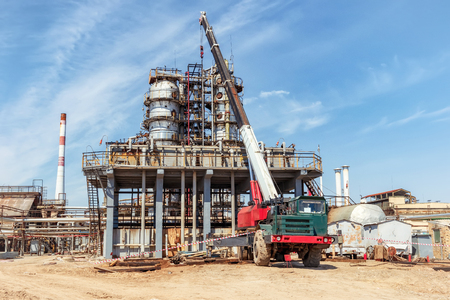 Repair work on the old oil and chemical production with the use of the old special heavy-duty truck craneの写真素材
