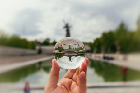 Monument Motherland on Mamaev Kurgan. The photo is made through a glass ballの写真素材