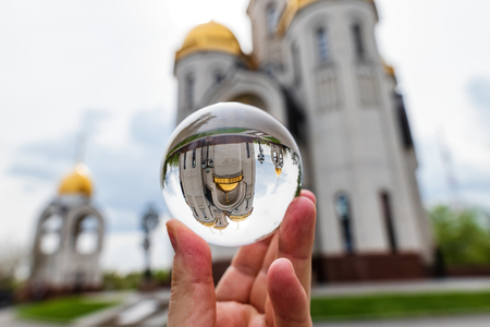 Orthodox Church of all saints on top of Mamayev Kurgan . Photo taken through the lensball.の写真素材