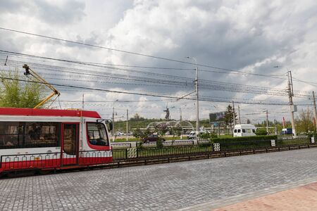 VOLGOGRAD - MAY 4: High-speed tram pulls up to the stop Volgograd stadium-arena. May 4, 2019 in Volgograd, Russia.のeditorial素材