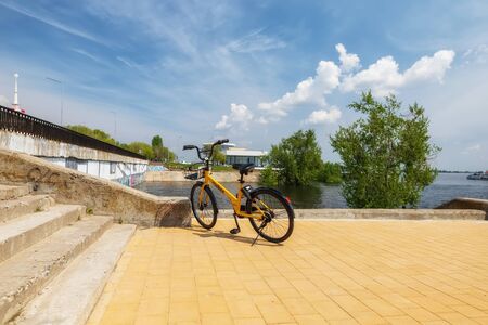 VOLGOGRAD - MAY 4: Mobee bike from the city bike rental left by negligent users in the city Park. May 4, 2019 in Volgograd, Russia.のeditorial素材
