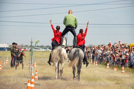 VOLGOGRAD, RUSSIA - JUNE 8: Demonstration of Cossacks ability of representatives to stay in saddle and perform tricks on horseback. June 8, 2019 in Volgograd, Russia.のeditorial素材