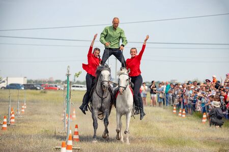 VOLGOGRAD, RUSSIA - JUNE 8: Demonstration of Cossacks ability of representatives to stay in saddle and perform tricks on horseback. June 8, 2019 in Volgograd, Russia.のeditorial素材