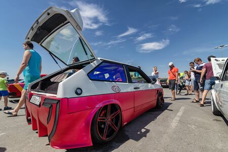 VOLGOGRAD, RUSSIA - JULY 7: Serial cars with tuning and improved engines at the open air exhibition. July 7, 2019 in Volgograd, Russia.のeditorial素材