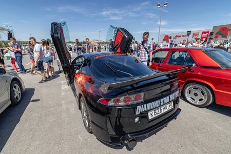 VOLGOGRAD, RUSSIA - JULY 7: Serial cars with tuning and improved engines at the open air exhibition. July 7, 2019 in Volgograd, Russia.のeditorial素材