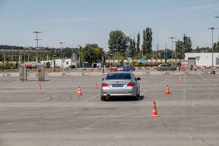 VOLGOGRAD, RUSSIA - JULY 7: Police traffic officers are involved in the time attack race in BMW patrol cars. July 7, 2019 in Volgograd, Russia.のeditorial素材