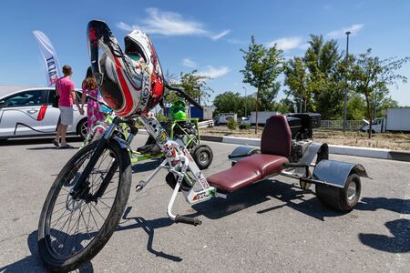 VOLGOGRAD, RUSSIA - JULY 7: Drift Trike with big front wheel and motor and exhaust pipe in the shape of mini gun. July 7, 2019 in Volgograd, Russia.のeditorial素材