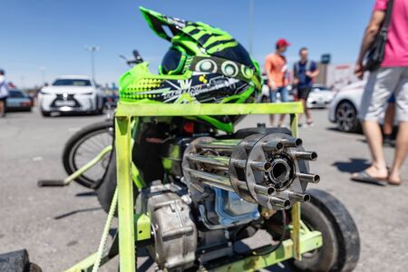 VOLGOGRAD, RUSSIA - JULY 7: Drift Trike with big front wheel and motor and exhaust pipe in the shape of mini gun. July 7, 2019 in Volgograd, Russia.のeditorial素材