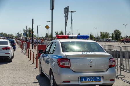 VOLGOGRAD, RUSSIA - JULY 7: A police car stands in the Parking lot of the shopping center during mass events. July 7, 2019 in Volgograd, Russia.のeditorial素材