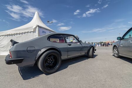 VOLGOGRAD, RUSSIA - JULY 7: Serial cars with tuning and improved engines at the open air exhibition. July 7, 2019 in Volgograd, Russia.のeditorial素材