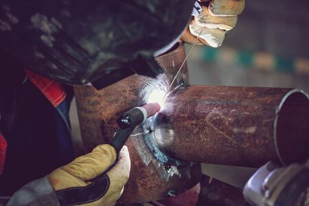 Argon arc welding control sample of carbon steel pipes. The sample is a pipe element with a pipe-to-pipe insertの写真素材