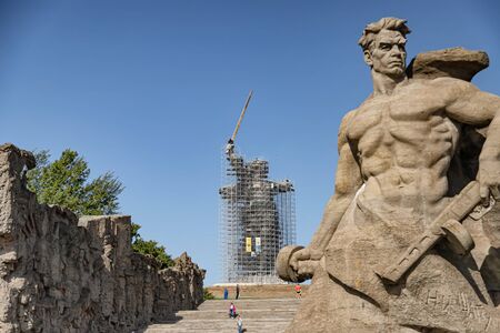 VOLGOGRAD - SEPTEMBER 17: Reconstruction monument "Motherland" on Mamaev Kurgan. The statue is shrouded in unique scaffolding in full growth. September 17, 2019 in Volgograd, Russia.のeditorial素材