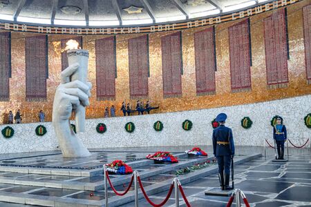 VOLGOGRAD - SEPTEMBER 17: Change of the guard of honor at the eternal flame in the hall of military...
