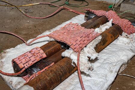 Preparation of blanks of pipeline parts for heat treatment with the help of flexible heating elementsの写真素材
