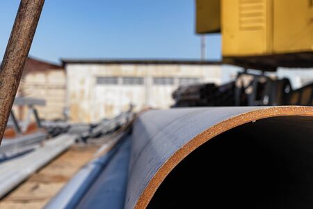 Steel pipe rolled products painted with gray ground paint in the warehouse of metal productsの写真素材