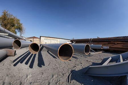 Steel pipe rolled products painted with gray ground paint in the warehouse of metal productsの写真素材