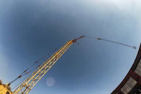 Wheeled truck crane for loading heavy metal in the warehouse of the production base of metal structuresの写真素材