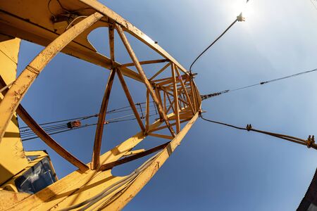 Wheeled truck crane for loading heavy metal in the warehouse of the production base of metal structuresの写真素材