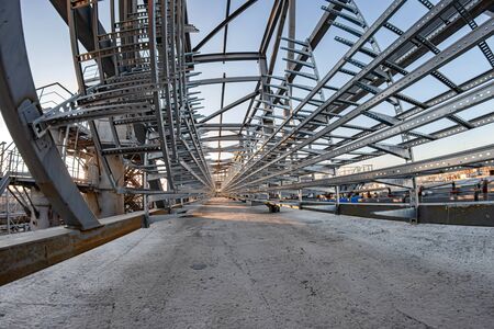 Construction of a new cable overpass made of aluminum profile with a concrete base