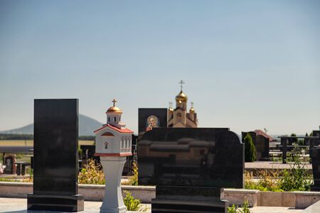 Marble monuments and decorative architectural elements at the cemetery in the Cossack village in the Caucasusの写真素材