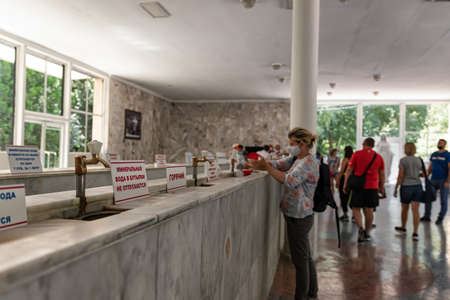 ESSENTUKI- AUGUST 19: Tourists of the Spa town visit the gallery of drinking mineral water in...