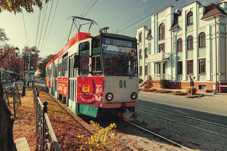 PYATIGORSK - OCTOBER 10: City tram rides through the autumn streets in the tourist center. October 10, 2020 in Pyatigorsk, Russia.のeditorial素材