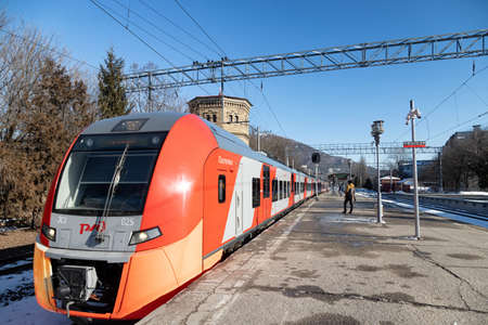 PYATIGORSK - JANUARY 22: High-speed train "Lastochka" plying between the resort cities arrives at the railway station. January 22, 2021 in Pyatigorsk, Russia.のeditorial素材