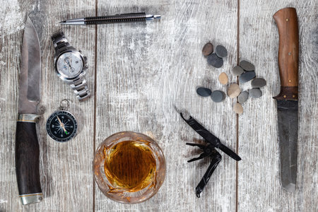 Men's items and accessories: knife, whiskey glass, stylish pen, watch and compassの写真素材