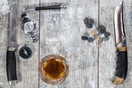 Men's items and accessories: knife, whiskey glass, stylish pen, watch and compassの写真素材