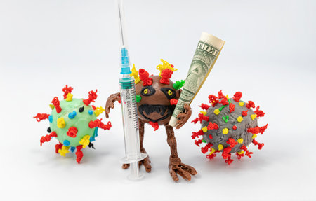 Monster virus is holding a syringe surrounded by other virusesの写真素材