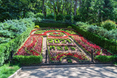 KISLOVODSK - JULY 03: Flower calendar in the city park, on which the date and time are laid out with flowers. July 03, 2021 in Kislovodsk, Russia.のeditorial素材