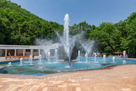 ZHELEZNOVODSK - JULY 04: A beautiful fountain in resort park of the city, in front of Smirnovsky spring. July 04, 2021 in Zheleznovodsk, Russia.のeditorial素材