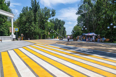 ZHELEZNOVODSK - AUGUST 07: A very wide pedestrian crossing, designed for a large flow of tourists, in the resort area of the city. August 07, 2021 in Zheleznovodsk, Russia.のeditorial素材