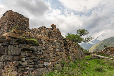 Ancient masonry made of large stones without bonding mortar in North Ossetiaの写真素材