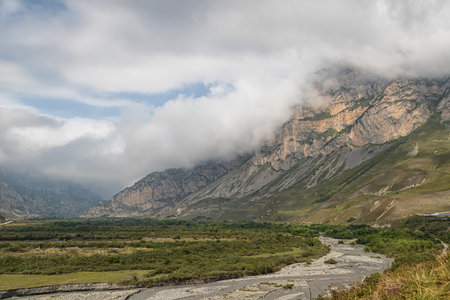 A small fast mountain river flows in a mountain gorgeの写真素材