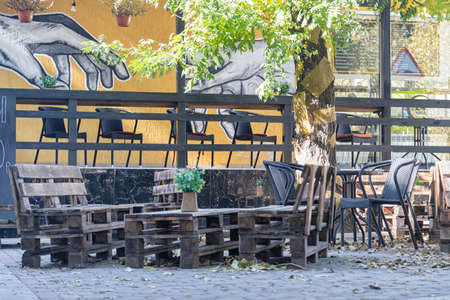 ESSENTUKI - OCTOBER 12: outdoor cafe furniture made of pallets in loft style. October 12, 2021 in Essentuki, Russiaのeditorial素材