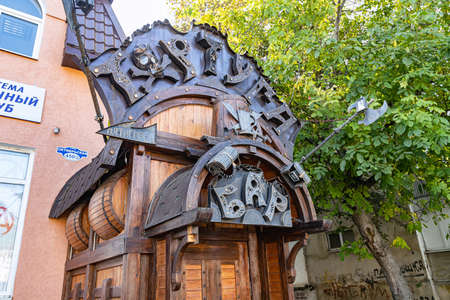 ESSENTUKI - OCTOBER 12: Entrance to the beer bar TORTUGA decorated in pirate style. October 12, 2021 in Essentuki, Russiaのeditorial素材