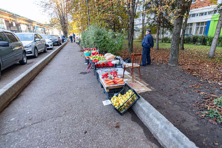 ESSENTUKI - OCTOBER 12: Trade in vegetables and fruits on the street under the open sky. October 12, 2021 in Essentuki, Russiaのeditorial素材