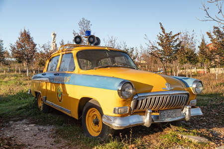 ESSENTUKI - OCTOBER 22: Old police car GAZ-21 Volga with a siren and a flasher. October 22, 2021 in Essentuki, Russiaのeditorial素材
