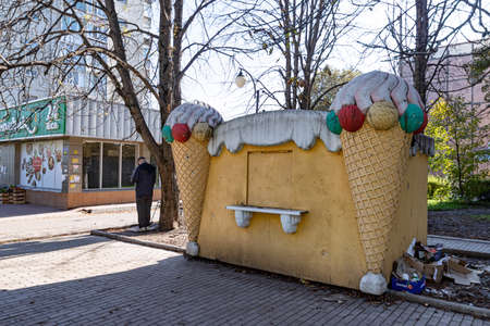 ESSENTUKI - OCTOBER 12: Ice cream stall decorated with pillars in the shape of an ice cream cone. October 12, 2021 in Essentuki, Russiaのeditorial素材
