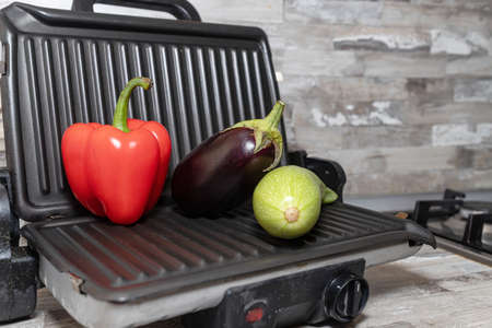 Proper nutrition is simple: grilled vegetables in kitchenの写真素材
