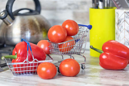 Concept: fast delivery of fresh vegetables from the store to your kitchenの写真素材