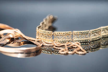 Three different gold chains in shape and sizeの写真素材