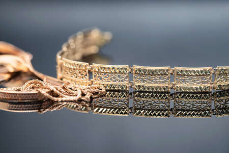 Three different gold chains in shape and sizeの写真素材