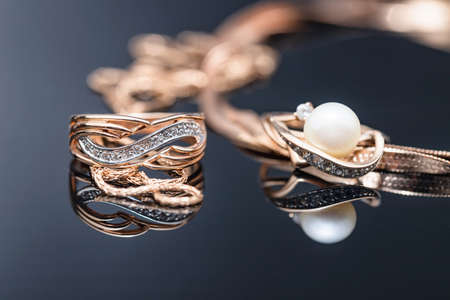Elegant gold ring decorated with small precious stonesの写真素材